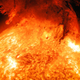 Imagen para el artículo titulado Cuando encuentres la Tierra en esta imagen de una erupción solar te sentirás muy pequeño